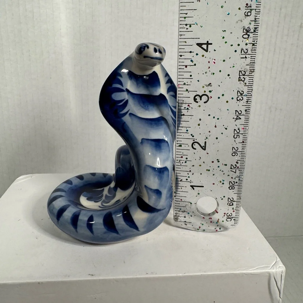 Vintage ceramic snake, white and blue, with flowers from Russi